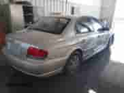 2003 Hyundai Sonata with VIN KMHWF25S03A787704, listed as a IAAI auction lot 41299327 with 208,289 mi miles and . Bid and sale history available at DreamBid. Image 4.