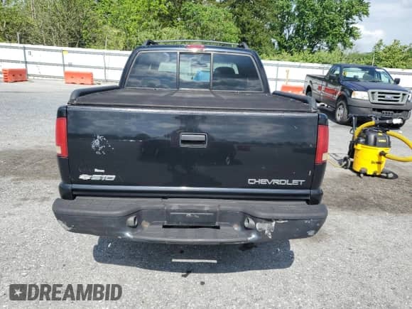 2004 Chevrolet S-10 LS z VIN 1GCDT13X74K134585, wystawiony jako Copart lot #57352545 z przebiegiem 174 241 mil mil oraz Szkoda całkowita • Salvage title. Historia ofert i sprzedaży dostępna na DreamBid. Obrazek 6.