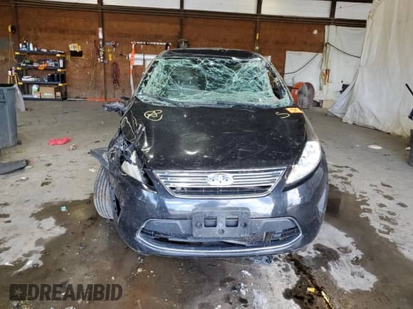 2011 Ford Fiesta S with VIN 3FADP4AJ7BM232421, listed as a Copart auction lot 69362695 with 142,734 mi miles and Salvage title. Bid and sale history available at DreamBid. Image 5.