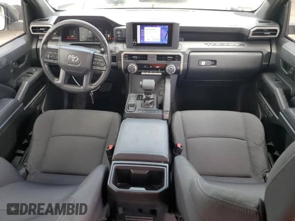 2025 Toyota Tacoma SR с VIN 3TYKD5HN3ST026011, выставлен на аукционе Copart как лот 80142185 с пробегом 7 865 миль миль и Списание • Salvage title. История ставок и продаж доступна на DreamBid. Изображение 8.