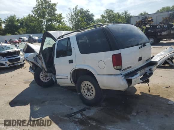 2000 Chevrolet Blazer LS с VIN 1GNDT13W7Y2169132, выставлен на аукционе Copart как лот 66609735 с пробегом Не указан миль и Списание • Salvage title. История ставок и продаж доступна на DreamBid. Изображение 2.