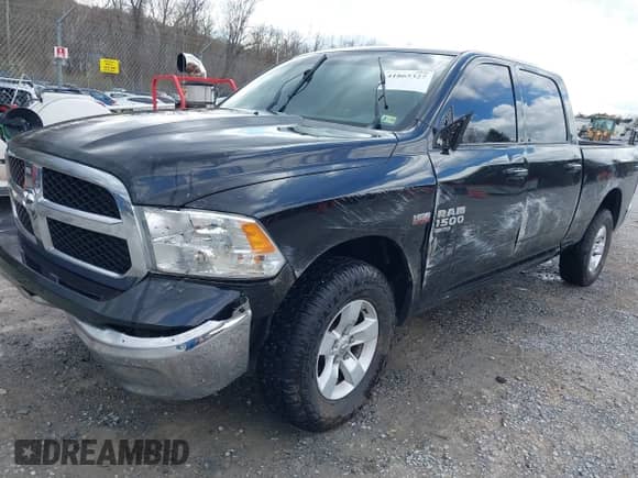 2019 Ram 1500 SLT z VIN 1C6RR7TT5KS714118, wystawiony jako IAAI lot #41865327 z przebiegiem 104 491 mil mil oraz . Historia ofert i sprzedaży dostępna na DreamBid. Obrazek 2.