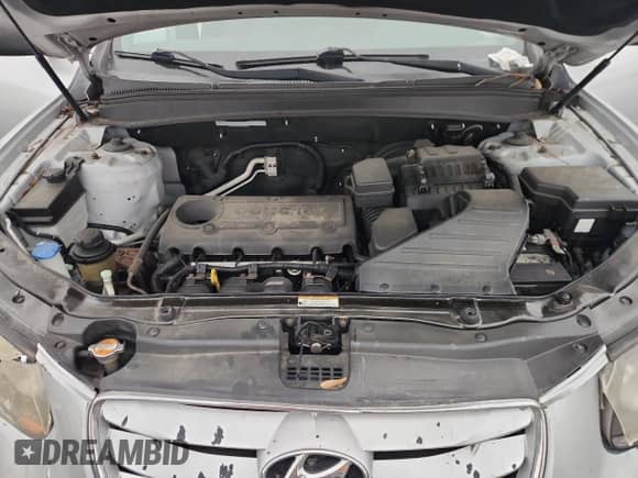 2011 Hyundai Santa Fe GLS z VIN 5XYZG3AB3BG010345, wystawiony jako Copart lot #86130735 z przebiegiem 147 205 mil mil oraz Szkoda całkowita • Salvage title. Historia ofert i sprzedaży dostępna na DreamBid. Obrazek 11.