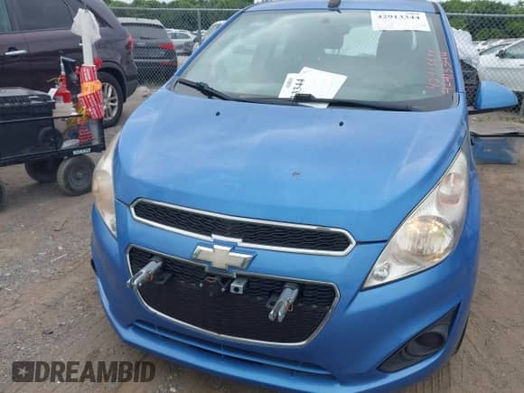 2014 Chevrolet Spark LS z VIN KL8CA6S94EC404457, wystawiony jako IAAI lot #42913344 z przebiegiem 44 872 mil mil oraz . Historia ofert i sprzedaży dostępna na DreamBid. Obrazek 6.