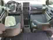 2010 Dodge Grand Caravan SXT with VIN 2D4RN5D10AR460200, listed as a Copart auction lot 71303905 with 172,308 mi miles and Salvage title. Bid and sale history available at DreamBid. Image 8.