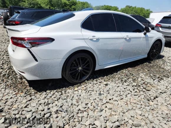 2022 Toyota Camry XSE with VIN 4T1K61BKXNU055868, listed as a Copart auction lot 65652195 with 56,360 mi miles and Salvage title. Bid and sale history available at DreamBid. Image 3.