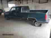 1995 GMC Sierra 1500 z VIN 2GTEC19K2S1558740, wystawiony jako Copart lot #69398185 z przebiegiem 386 899 mil mil oraz Szkoda całkowita • Salvage title. Historia ofert i sprzedaży dostępna na DreamBid. Obrazek 2.
