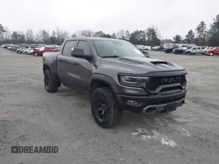 2023 Ram 1500 TRX z VIN 1C6SRFU94PN573059, wystawiony jako IAAI lot #41356250 z przebiegiem 11 719 mil mil oraz . Historia ofert i sprzedaży dostępna na DreamBid. Obrazek 1.