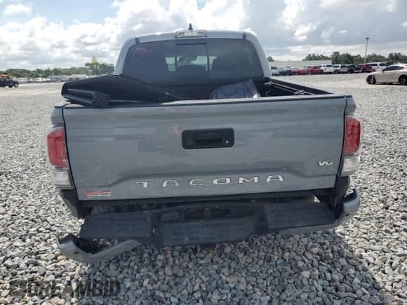 2021 Toyota Tacoma SR5 with VIN 3TMAZ5CN9MM148312, listed as a Copart auction lot 63611885 with 95,209 mi miles and Salvage title. Bid and sale history available at DreamBid. Image 6.