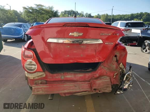 2015 Chevrolet Sonic LTZ with VIN 1G1JE5SB4F4193863, listed as a Copart auction lot 70715485 with Not provided miles and Salvage title. Bid and sale history available at DreamBid. Image 6.