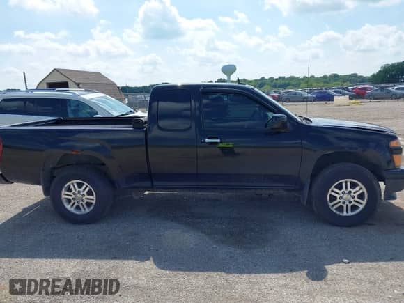 2012 Chevrolet Colorado 1LT z VIN 1GCJTCFE0C8137123, wystawiony jako IAAI lot #42542154 z przebiegiem 153 400 mil mil oraz . Historia ofert i sprzedaży dostępna na DreamBid. Obrazek 13.