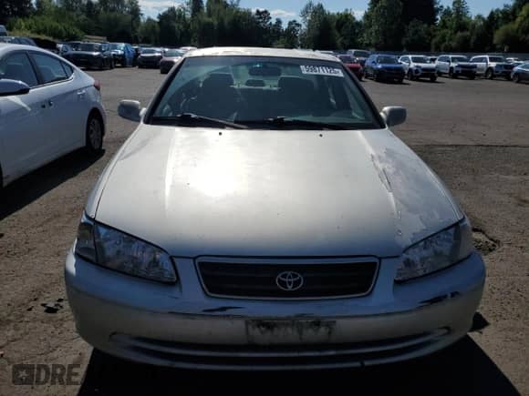 2001 Toyota Camry LE with VIN JT2BF22K010338767, listed as a Copart auction lot 59871125 with 299,672 mi miles and Salvage title. Bid and sale history available at DreamBid. Image 5.