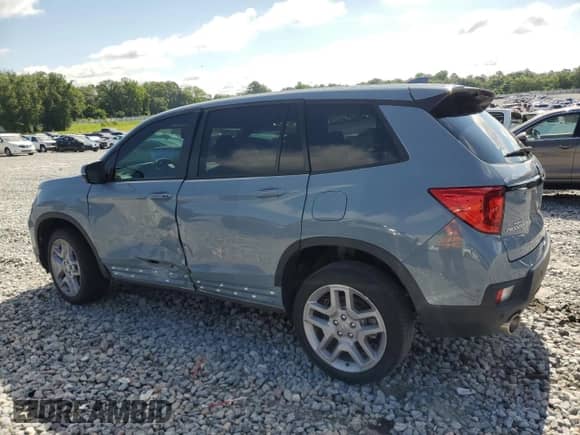 2024 Honda Passport EX-L with VIN 5FNYF8H5XRB018374, listed as a Copart auction lot 60676545 with 30,898 mi miles and Salvage title. Bid and sale history available at DreamBid. Image 2.