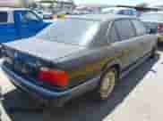 1998 BMW 7 Series 740iL with VIN WBAGJ832XWDM16899, listed as a IAAI auction lot 42361106 with 177,379 mi miles and . Bid and sale history available at DreamBid. Image 4.