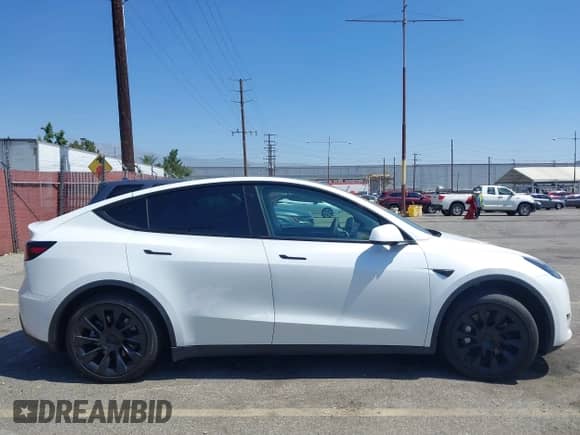 2022 Tesla Model Y Long Range z VIN 7SAYGDEE3NF545146, wystawiony jako IAAI lot #42724193 z przebiegiem Nie podano mil oraz . Historia ofert i sprzedaży dostępna na DreamBid. Obrazek 14.