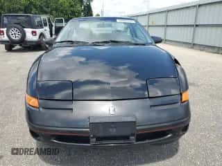 1996 Saturn 2dr Coupe с VIN 1G8ZH1279TZ371071, выставлен на аукционе Copart как лот 66602245 с пробегом 107 563 миль миль и Списание • Salvage title. История ставок и продаж доступна на DreamBid. Изображение 5.