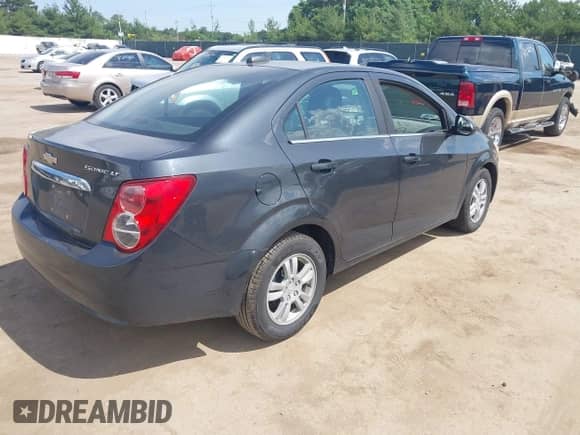 2015 Chevrolet Sonic LT with VIN 1G1JC5SH6F4128961, listed as a IAAI auction lot 42585563 with 120,862 mi miles and . Bid and sale history available at DreamBid. Image 4.