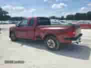 1999 Ford F-150 XL with VIN 2FTRX07W9XCA39220, listed as a Copart auction lot 81018635 with 213,635 mi miles and Salvage title. Bid and sale history available at DreamBid. Image 2.