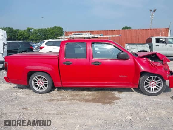 2005 Chevrolet Colorado 1SB LS Z85 z VIN 1GCCS136358223042, wystawiony jako IAAI lot #42457920 z przebiegiem 159 492 mil mil oraz . Historia ofert i sprzedaży dostępna na DreamBid. Obrazek 13.