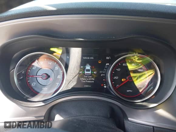 2023 Dodge Charger SXT with VIN 2C3CDXBG7PH660986, listed as a IAAI auction lot 43233732 with 23,404 mi miles and . Bid and sale history available at DreamBid. Image 7.