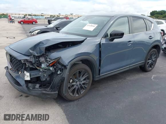 2023 Mazda CX-5 S Carbon Edition z VIN JM3KFBCM1P0132803, wystawiony jako IAAI lot #43128566 z przebiegiem 37 967 mil mil oraz . Historia ofert i sprzedaży dostępna na DreamBid. Obrazek 17.