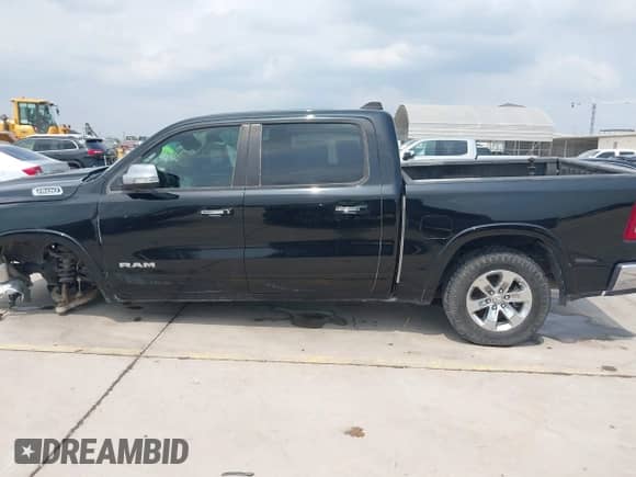 2021 Ram 1500 Laramie with VIN 1C6SRFJTXMN751178, listed as a IAAI auction lot 41802863 with 86,251 mi miles and . Bid and sale history available at DreamBid. Image 15.