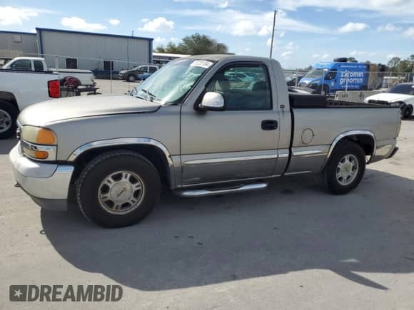 1999 GMC Sierra 1500 SL with VIN 1GTEC14V8XZ527685, listed as a Copart auction lot 80085184 with 263,164 mi miles and Clean title. Bid and sale history available at DreamBid. Image 1.