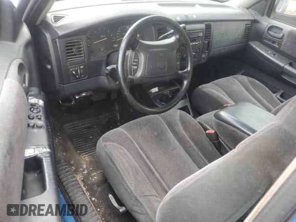 2001 Dodge Dakota z VIN 1B7GG22X61S222810, wystawiony jako Copart lot #62670635 z przebiegiem Nie podano mil oraz Szkoda całkowita • Salvage title. Historia ofert i sprzedaży dostępna na DreamBid. Obrazek 8.