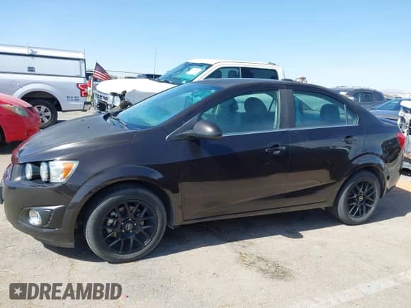 2015 Chevrolet Sonic LT with VIN 1G1JD5SH3F4138201, listed as a IAAI auction lot 42253033 with 123,894 mi miles and . Bid and sale history available at DreamBid. Image 14.