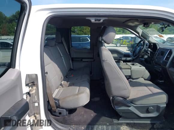 2017 Ford F-150 XL with VIN 1FTEX1E85HFA13986, listed as a IAAI auction lot 43231920 with 188,338 mi miles and . Bid and sale history available at DreamBid. Image 8.