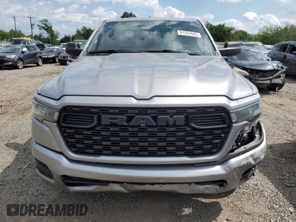 2025 Ram 1500 Tradesman with VIN 1C6RREGG1SN645797, listed as a Copart auction lot 61264645 with 2,386 mi miles and Salvage title. Bid and sale history available at DreamBid. Image 5.