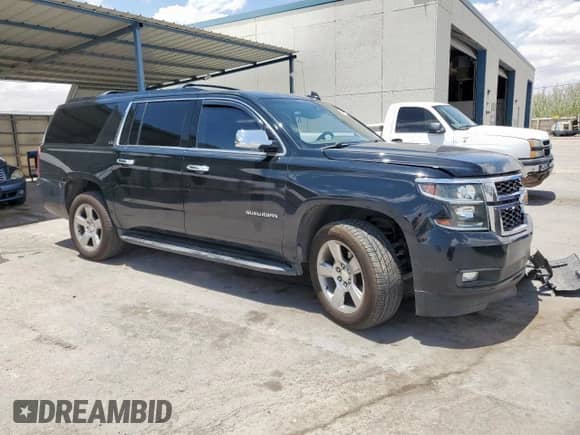2015 Chevrolet Suburban LS с VIN 1GNSCHKC2FR707277, выставлен на аукционе Copart как лот 59541635 с пробегом 198 876 миль миль и Списание • Salvage title. История ставок и продаж доступна на DreamBid. Изображение 4.
