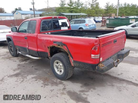 1998 Dodge Dakota SLT z VIN 1B7GG22Y1WS519712, wystawiony jako IAAI lot #41913541 z przebiegiem 232 892 mil mil oraz . Historia ofert i sprzedaży dostępna na DreamBid. Obrazek 3.