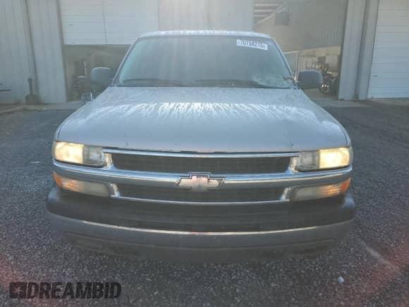 2004 Chevrolet Tahoe LS with VIN 1GNEC13Z84R250995, listed as a Copart auction lot 70758215 with 205,024 mi miles and Salvage title. Bid and sale history available at DreamBid. Image 5.