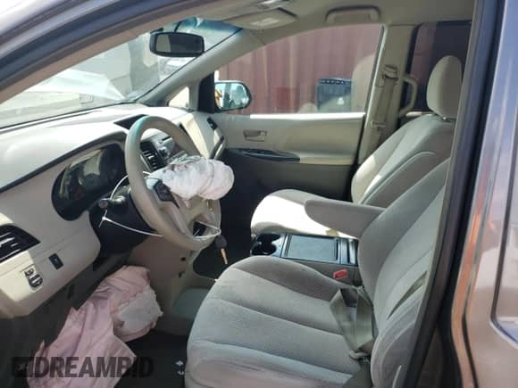 2012 Toyota Sienna LE with VIN 5TDJK3DC2CS033328, listed as a Copart auction lot 62202895 with 169,392 mi miles and Salvage title. Bid and sale history available at DreamBid. Image 7.