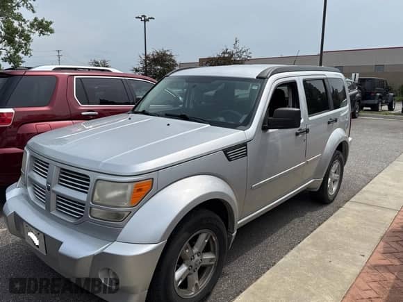 2011 Dodge Nitro SXT с VIN 1D4PT5GK5BW533989, выставлен на аукционе Copart как лот 61019655 с пробегом 190 113 миль миль и Чистый • Clean title. История ставок и продаж доступна на DreamBid. Изображение 2.