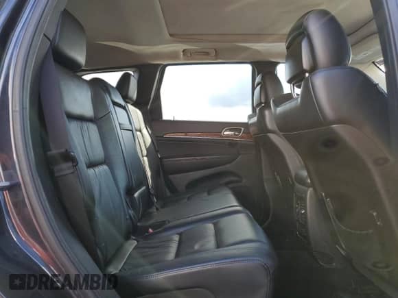 2013 Jeep Grand Cherokee Limited z VIN 1C4RJFBG2DC640359, wystawiony jako Copart lot #86685655 z przebiegiem 150 067 mil mil oraz Szkoda całkowita • Salvage title. Historia ofert i sprzedaży dostępna na DreamBid. Obrazek 11.