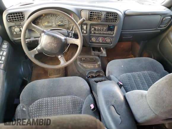 2000 Chevrolet Blazer LT with VIN 1GNCS13W6Y2181741, listed as a Copart auction lot 77990304 with 188,281 mi miles and Salvage title. Bid and sale history available at DreamBid. Image 8.