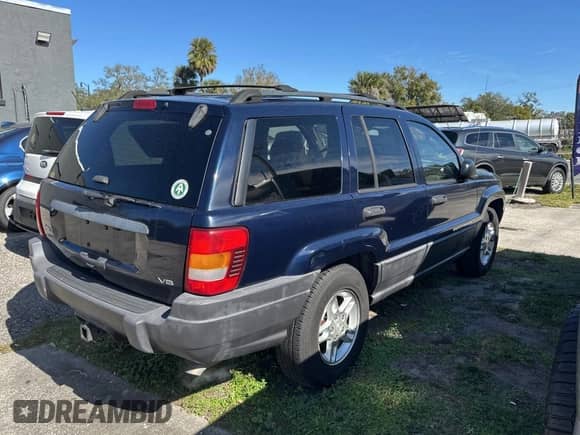 2004 Jeep Grand Cherokee Laredo z VIN 1J4GX48N24C436753, wystawiony jako Copart lot #88142905 z przebiegiem 114 022 mil mil oraz Czysty tytuł • Clean title. Historia ofert i sprzedaży dostępna na DreamBid. Obrazek 4.