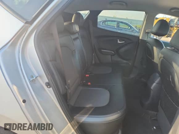 2013 Hyundai Tucson GLS z VIN KM8JUCAC6DU737734, wystawiony jako Copart lot #69121445 z przebiegiem 175 691 mil mil oraz Czysty tytuł • Clean title. Historia ofert i sprzedaży dostępna na DreamBid. Obrazek 11.