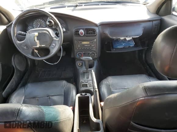 2002 Saturn SC с VIN 1G8ZY14762Z129155, выставлен на аукционе Copart как лот 75820394 с пробегом 199 847 миль миль и Списание • Salvage title. История ставок и продаж доступна на DreamBid. Изображение 8.