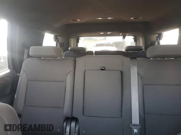 2023 Chevrolet Tahoe LS z VIN 1GNSKMKD9PR107491, wystawiony jako Copart lot #51268465 z przebiegiem 52 053 mil mil oraz Szkoda całkowita • Salvage title. Historia ofert i sprzedaży dostępna na DreamBid. Obrazek 10.