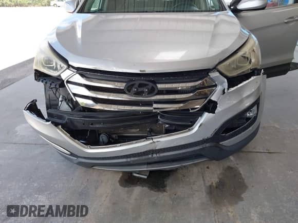 2013 Hyundai Santa Fe Sport with VIN 5XYZU3LA0DG098741, listed as a IAAI auction lot 43054236 with 136,127 mi miles and . Bid and sale history available at DreamBid. Image 6.