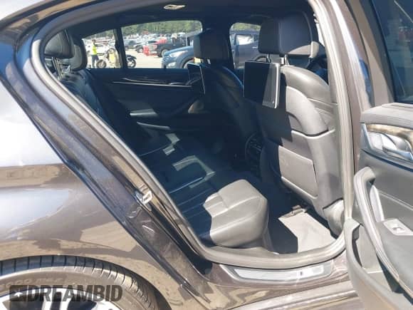 2017 BMW 5 Series 530i xDrive with VIN WBAJA7C35HG457970, listed as a IAAI auction lot 43197875 with 84,885 mi miles and . Bid and sale history available at DreamBid. Image 8.