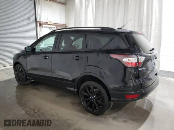 2017 Ford Escape Titanium с VIN 1FMCU9JD2HUD17267, выставлен на аукционе Copart как лот 86828485 с пробегом 72 989 миль миль и Списание • Salvage title. История ставок и продаж доступна на DreamBid. Изображение 2.