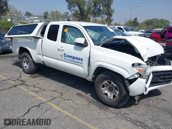 2020 Toyota Tacoma SR with VIN 3TYRX5GN2LT001173, listed as a IAAI auction lot 42956322 with 119,729 mi miles and . Bid and sale history available at DreamBid. Image 1.