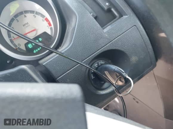 2009 Dodge Grand Caravan SE with VIN 2D8HN44E19R575827, listed as a IAAI auction lot 42812571 with 165,084 mi miles and . Bid and sale history available at DreamBid. Image 11.