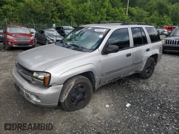 2004 Chevrolet TrailBlazer LT with VIN 1GNDS13S342302480, listed as a Copart auction lot 64365275 with 263,074 mi miles and Salvage title. Bid and sale history available at DreamBid. Image 1.
