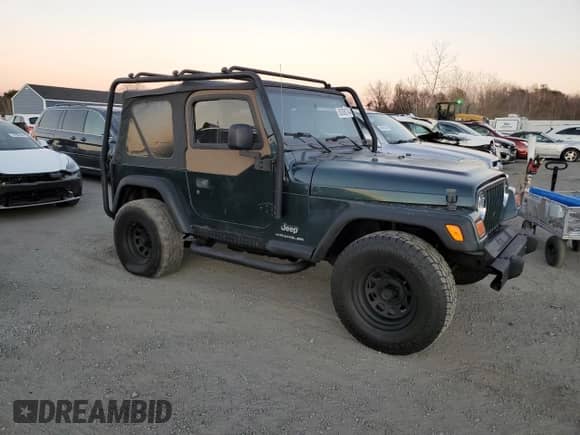 2005 Jeep Wrangler SE z VIN 1J4FA29155P363501, wystawiony jako Copart lot #80388314 z przebiegiem 97 564 mil mil oraz Czysty tytuł • Clean title. Historia ofert i sprzedaży dostępna na DreamBid. Obrazek 4.