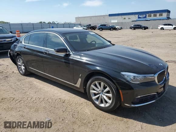 2017 BMW 7 Series 740e xDrive with VIN WBA7J2C31HG497945, listed as a Copart auction lot 80494365 with 54,846 mi miles and Salvage title. Bid and sale history available at DreamBid. Image 4.